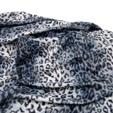 Fellimitat Schneeleopard