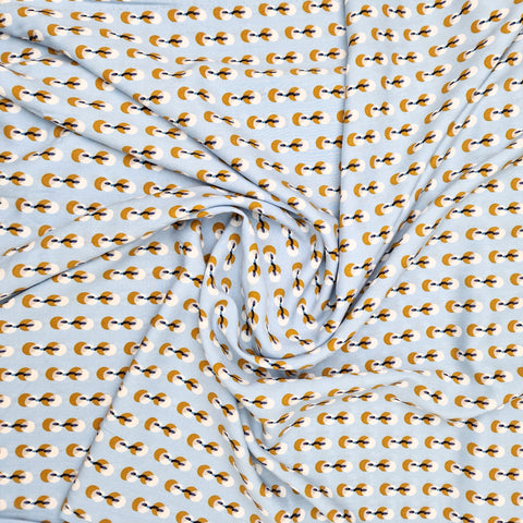 Viskose hellblau mit senfgelben Kreisen